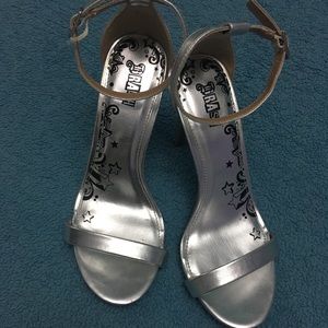 Brash silver strap heels
